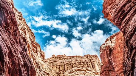 Majestic Canyon Vista Under Bright Blue Sky wallpaper