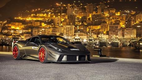 Ferrari 458 Elegance Amidst Night Cityscape wallpaper