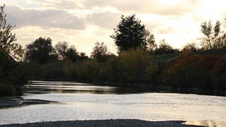 Tranquil River Under Cloudy Skies Natural Beauty wallpaper