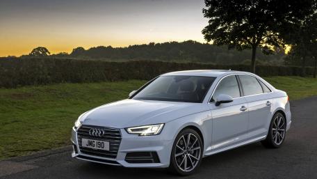 Sleek Audi A4 at Sunset Glow wallpaper