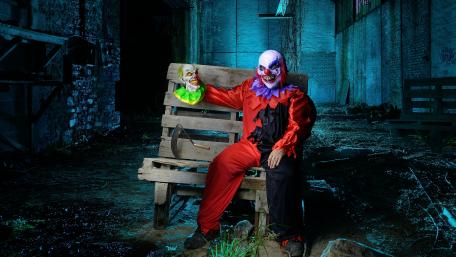 Creepy Clown on a Haunted Bench wallpaper