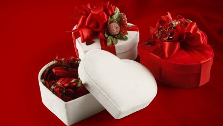 Heartfelt Gift Boxes for Love's Special Day wallpaper