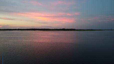 Tranquil Evening Reflections Over Water wallpaper
