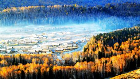 Autumn Serenity Over a Quiet Village Landscape wallpaper