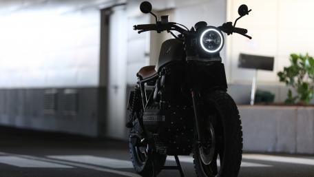 Sleek BMW Motorcycle in Dim Light Showcase wallpaper