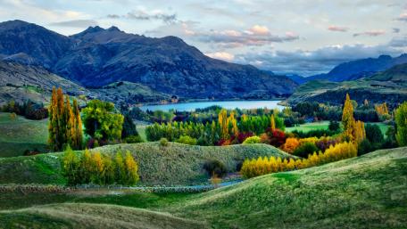 Autumn Serenity in Majestic Mountains and Tranquil Lake wallpaper