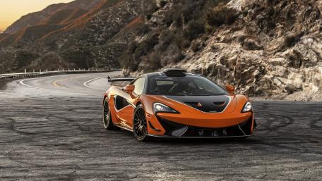 Dream Ride Through Mountain Curves wallpaper