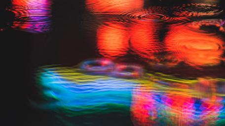 Vibrant Reflections in Rainy Night Bokeh wallpaper