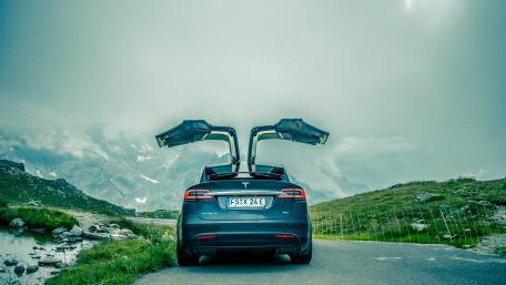 Tesla Model X in Serene Mountain Escape wallpaper