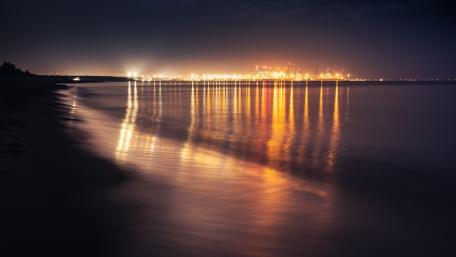 Twilight Reflections Over Calm Waters wallpaper