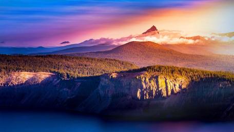 Majestic Mountains Under a Purple Sky wallpaper