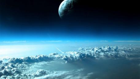 Majestic Planet Above Serene Clouds wallpaper