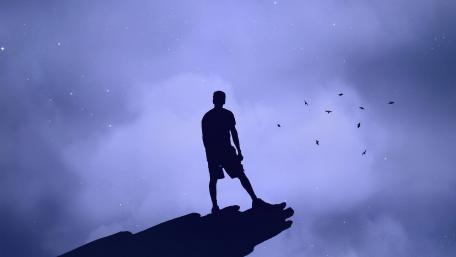 Silhouette of Solitude in a Cloudy Sky wallpaper