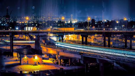 Urban Nightscape Illuminated by City Lights wallpaper