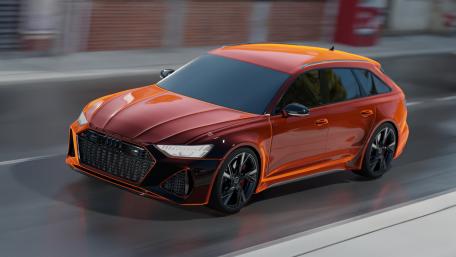 Dynamic Audi Sportscar in Striking Orange and Black Finish wallpaper