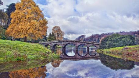 Autumn Serenity by the Stone Bridge wallpaper