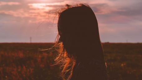 Girl in a Meadow at Sunset wallpaper