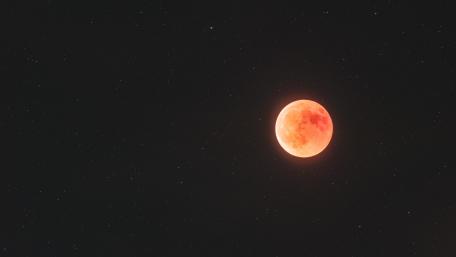 Celestial Beauty of the Full Moon in Red Glow wallpaper