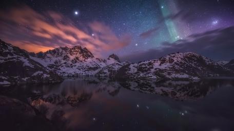 Starlit Serenity over Snowy Peaks and Reflections wallpaper