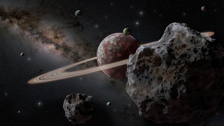 Ringed Planet and Asteroids in the Milky Way Galaxy wallpaper