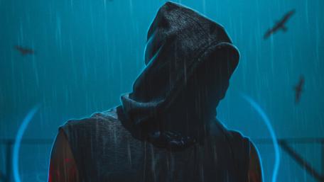 Faceless Hooded Figure in the Rain wallpaper
