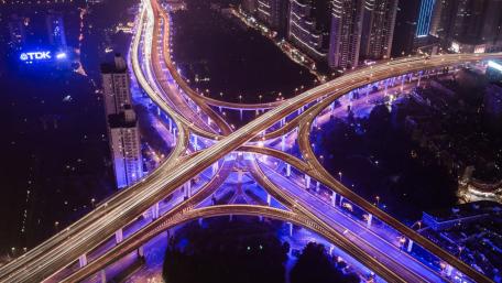 Vibrant Nighttime City Intersection Scene wallpaper