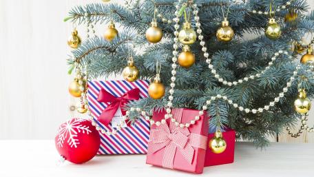 Festive Christmas Gifts Under the Tree wallpaper