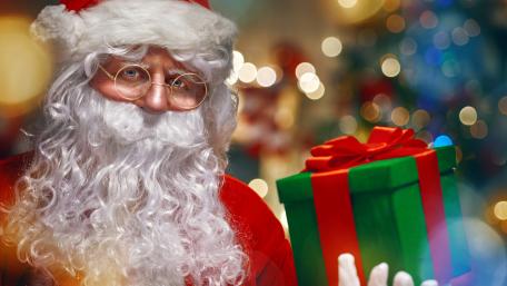 Festive Santa Claus Ready for Christmas Delivery wallpaper