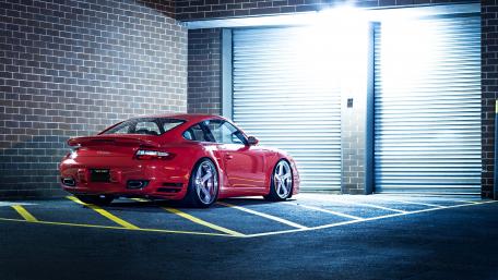 Vibrant Fantasy Porsche in Urban Night Scene wallpaper