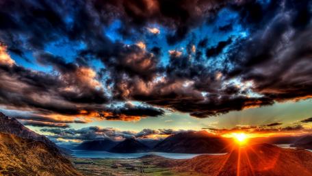 Vibrant Sunset Overclouded Mountains wallpaper