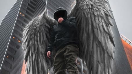Mysterious Angel in the Cityscape wallpaper