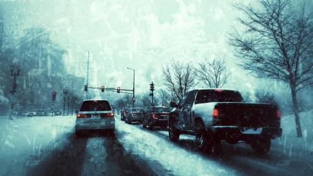 Winter Traffic Halted by Snowy Roads wallpaper