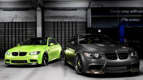 BMW Power Unleashed in Stunning Showroom Display wallpaper