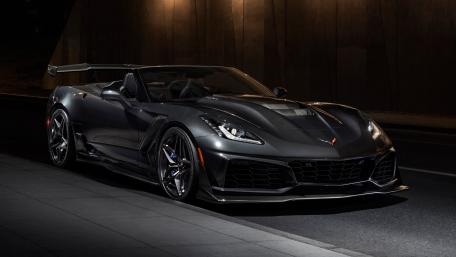 Sleek Black Corvette ZR1 Under Night Lights wallpaper