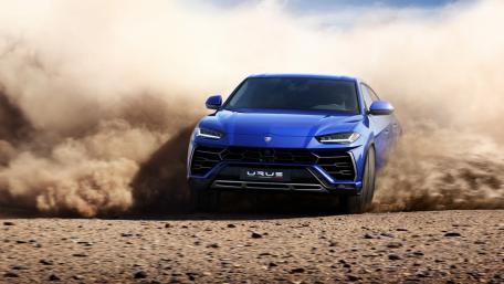 Lamborghini Urus Power Unleashed on Rugged Terrain wallpaper