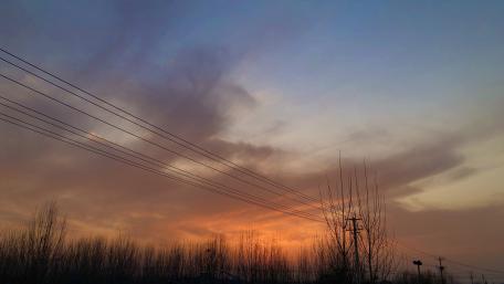 Vibrant Sunset Over Tranquil Landscape wallpaper