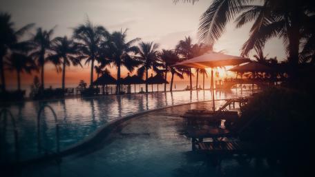 Serene Sunset by the Poolside Retreat wallpaper