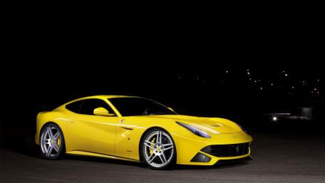Bold Yellow Ferrari F12 Berlinetta at Night wallpaper