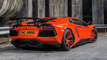 Stunning Lamborghini Aventador in Bold Orange Finish wallpaper