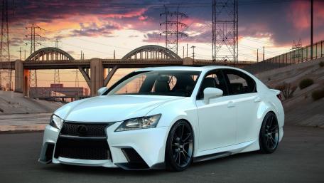 Sleek Lexus at Dusk in Urban Setting wallpaper