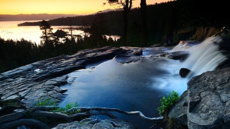 Serenity of a Tranquil Waterfall wallpaper