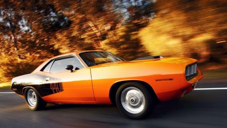 Classic Plymouth Barracuda on the Open Road wallpaper