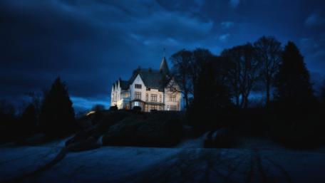 Mystical Mansion under the Night Sky wallpaper