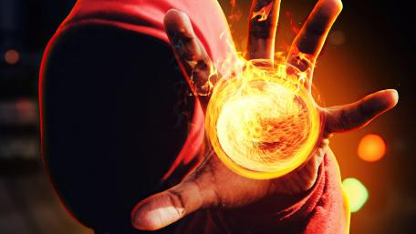 Mystical Fireball Creation in the Dark wallpaper