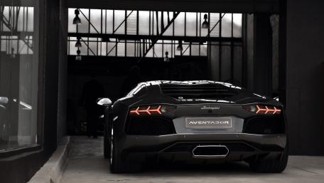 Sleek Lamborghini Aventador in a Modern Garage Setting wallpaper