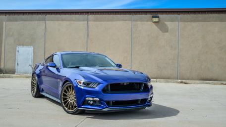 Sleek Blue Ford Mustang Wallpaper for Car Enthusiasts wallpaper