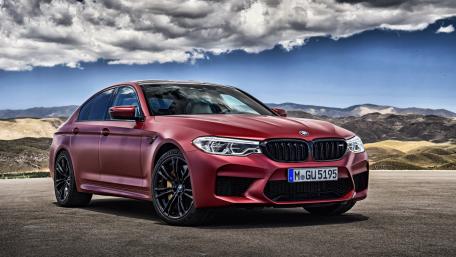 Sleek BMW M5 in a Stunning Landscape View wallpaper
