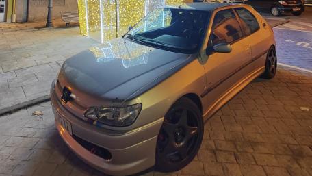 Classic Car in Urban Night Setting wallpaper