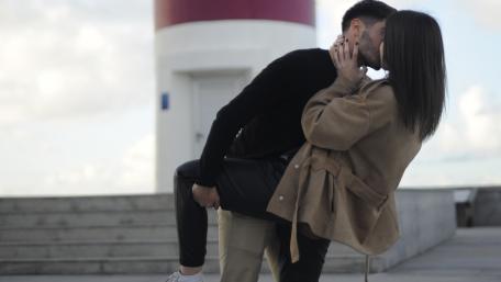 Romantic Kiss by the Lighthouse wallpaper