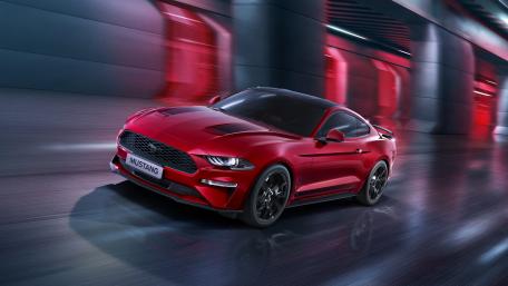 Red Ford Mustang in Motion wallpaper